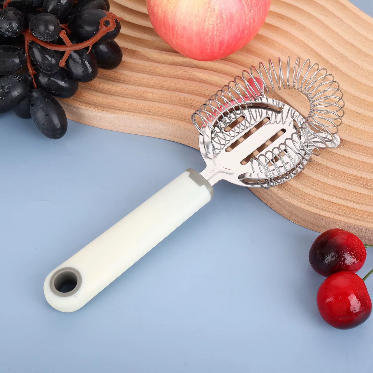 Écumoire en inox avec poignée