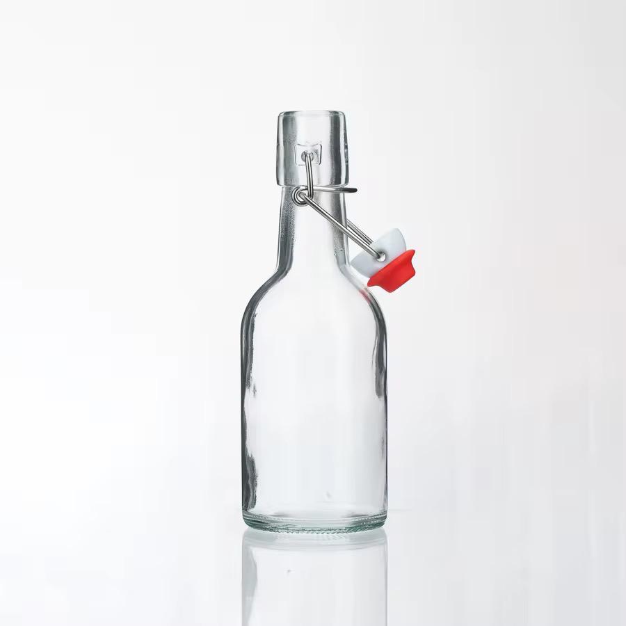 Petit modèle de bouteille en verre avec bouchon hermétique