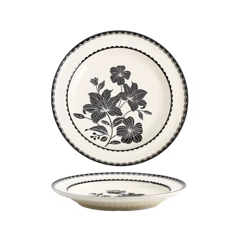 Assiette en céramique avec motifs floraux noir et blanc
