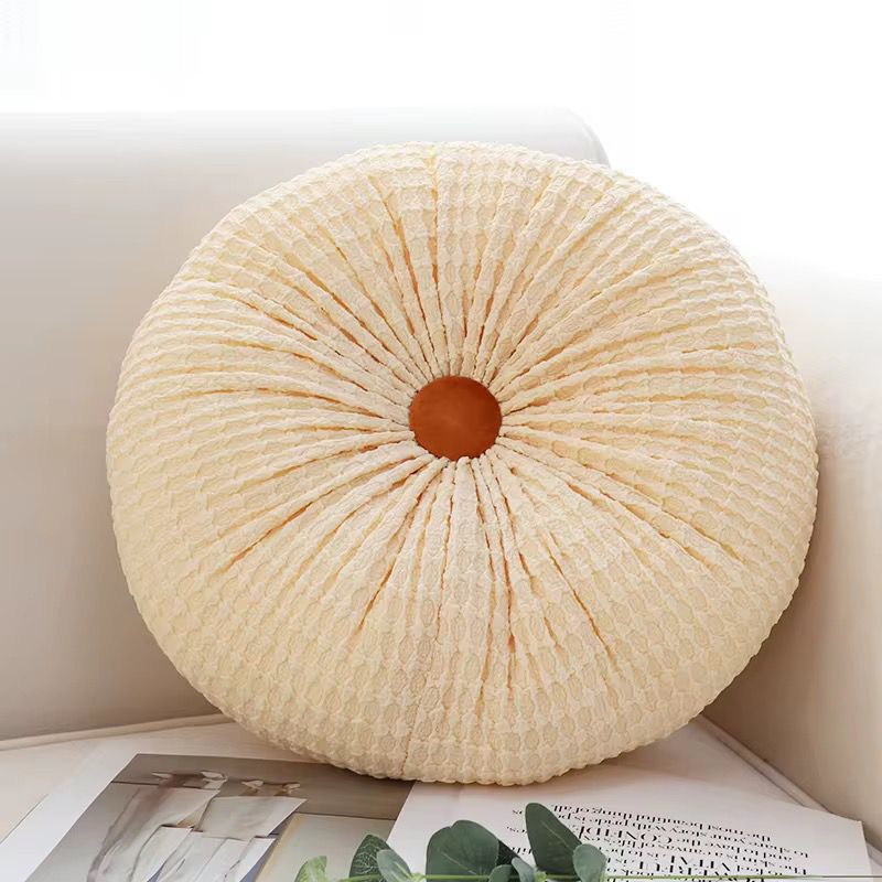 Coussin rond texturé