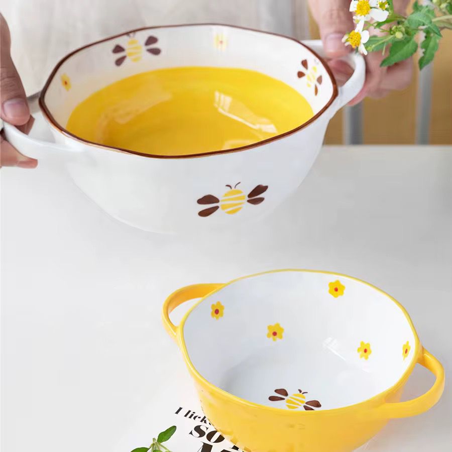 Bol en céramique décoré de motifs de fleurs et d'abeilles