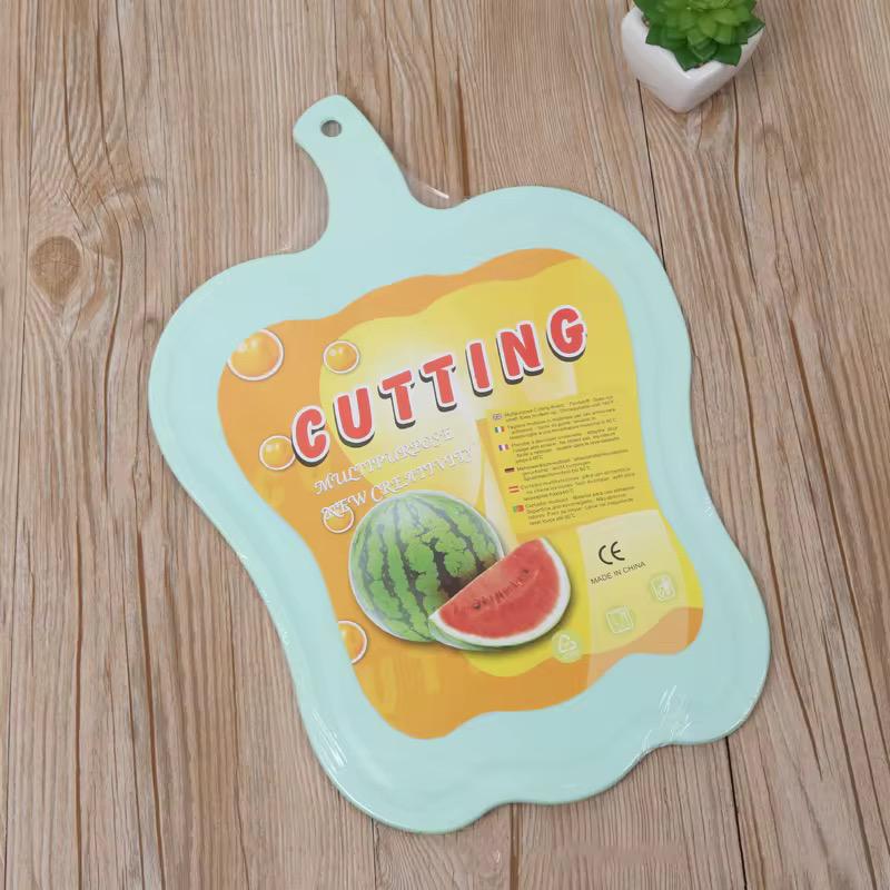 Planche à découper en forme de fruit