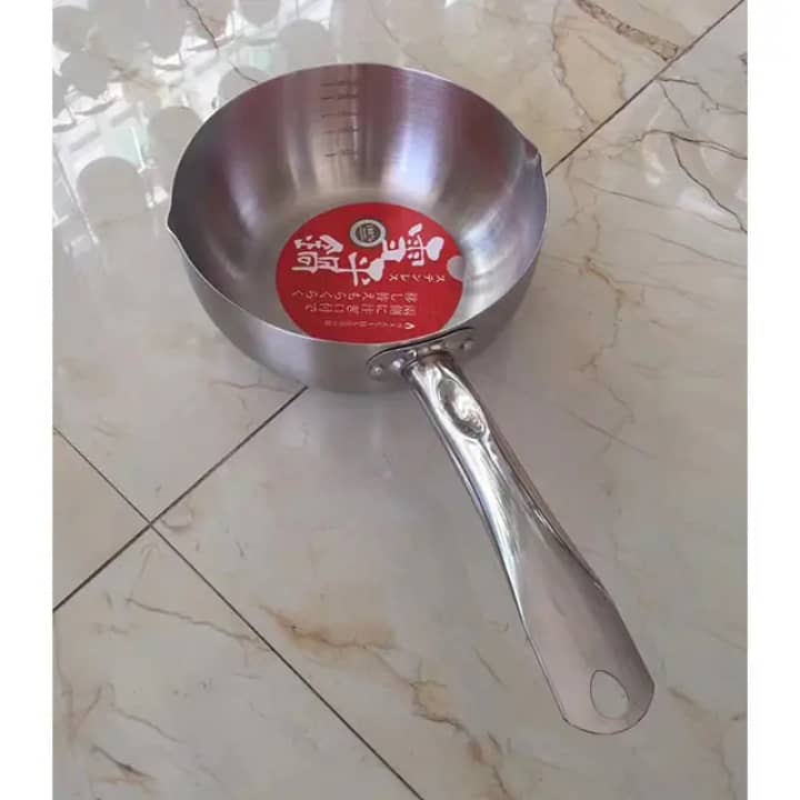 Wok en acier inoxydable